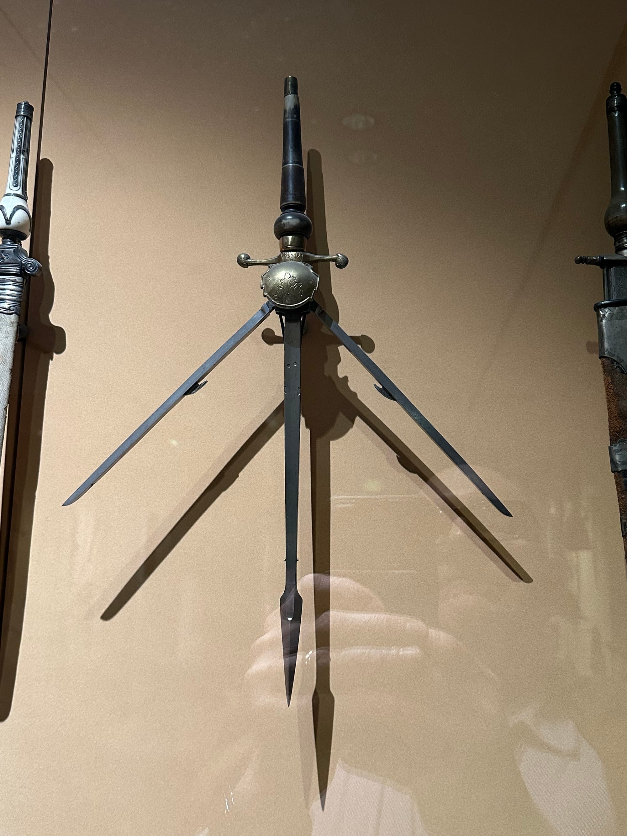 A dagger with three blades, the outer two of which extend at 45 degrees from the middle one. Very impractical looking.