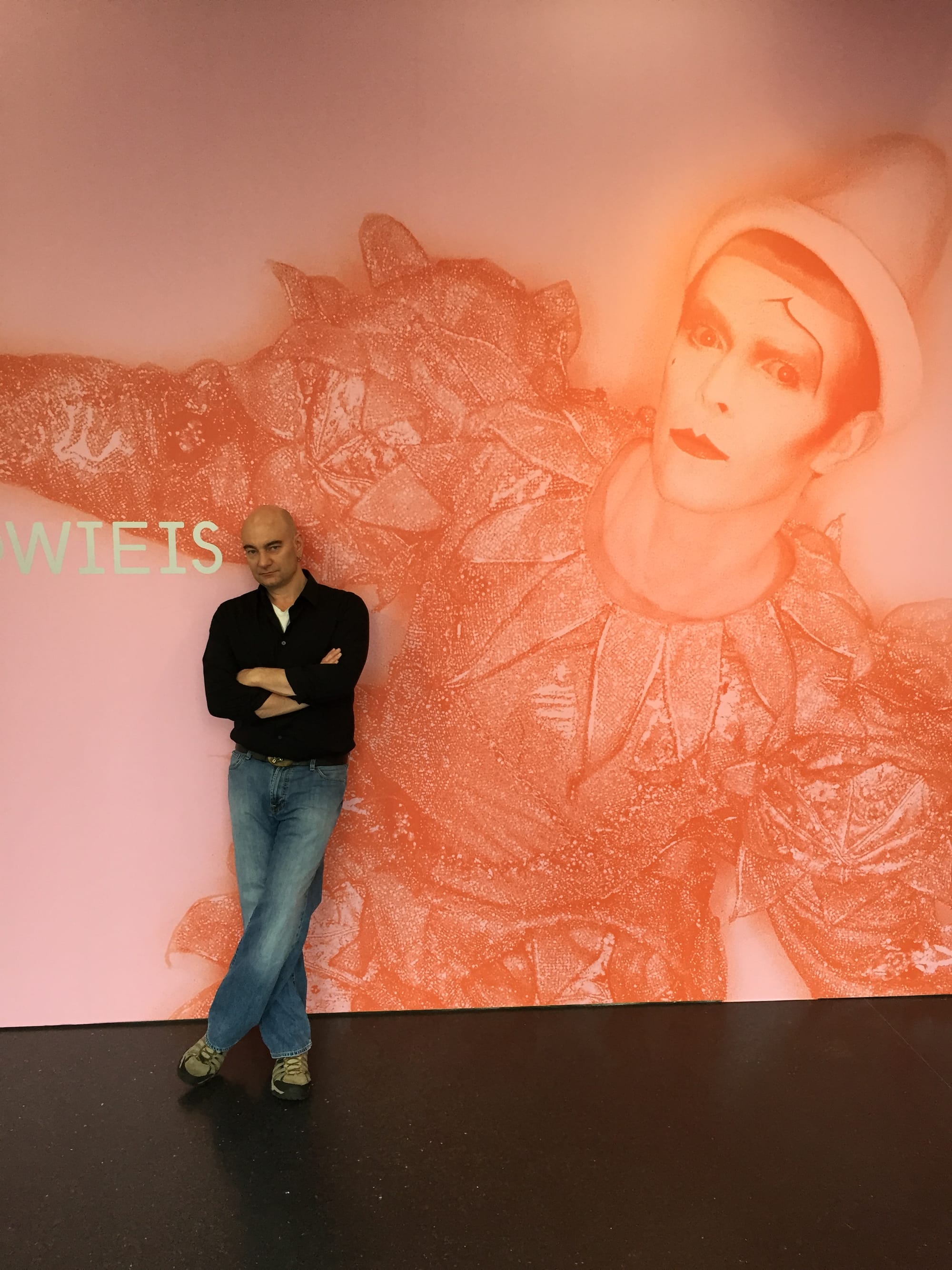 Me, in 2014, standing in front of a giant picture of Bowie from the exhibit David Bowie Is